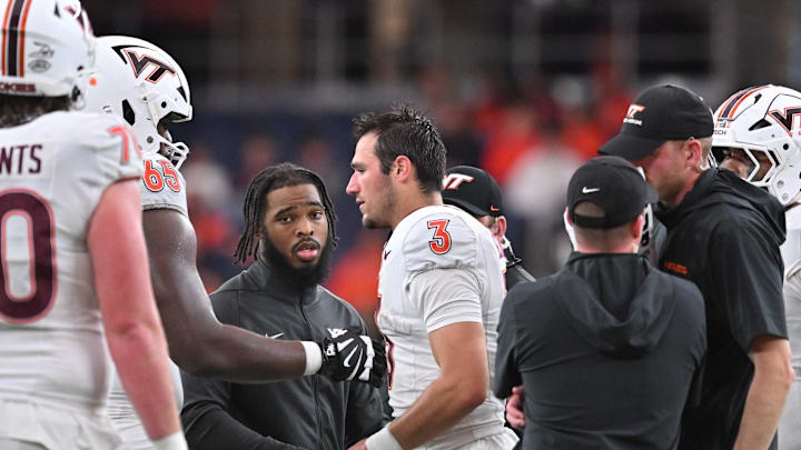Nov 2, 2024; Syracuse, New York, USA; Virginia Tech Hokies quarterback Collin Schlee (3) walks to the sideline after being injured in the fourth quarter against the Syracuse Orange at JMA Wireless Dome. Mandatory Credit: Mark Konezny-Imagn Images