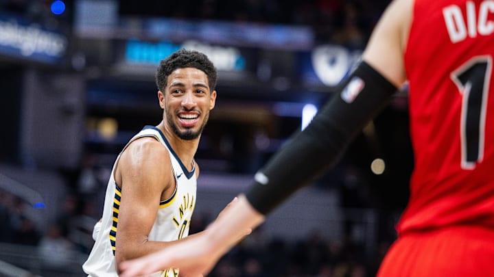 Feb 26, 2025; Indianapolis, Indiana, USA; Indiana Pacers guard Tyrese Haliburton (0) celebrates a made basket in the second half against the Toronto Raptors at Gainbridge Fieldhouse. Mandatory Credit: Trevor Ruszkowski-Imagn Images