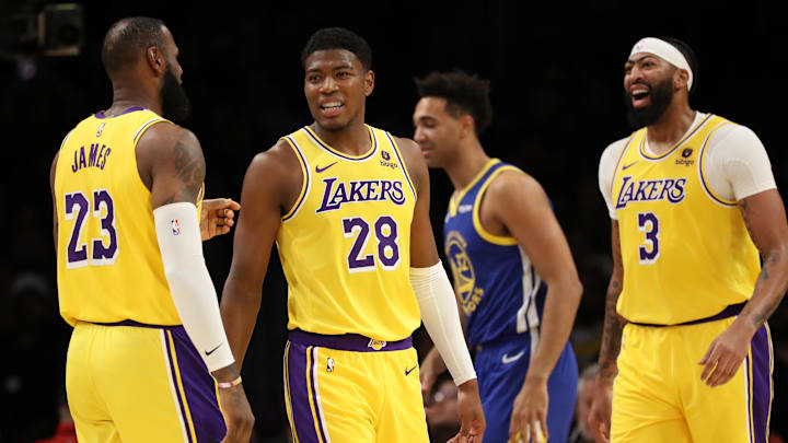 Los Angeles Lakers forward Rui Hachimura (28) smiles with forward LeBron James (23) and forward Anthony Davis (3) during the first half against the Golden State Warriors at Crypto.com Arena. Mandatory Credit: Kiyoshi Mio-Imagn Images