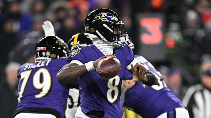 Jan 11, 2025; Baltimore, Maryland, USA; Baltimore Ravens quarterback Lamar Jackson (8) passes in the second quarter against the Pittsburgh Steelers in an AFC wild card game at M&T Bank Stadium. Mandatory Credit: Tommy Gilligan-Imagn Images