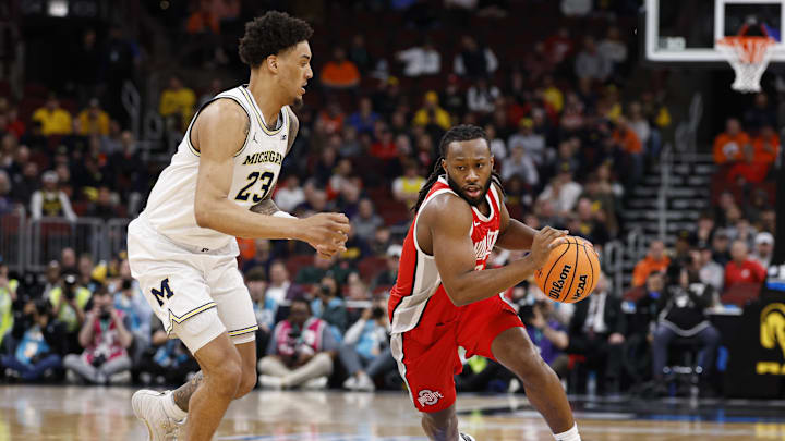 Mar 13, 2026; Chicago, IL, USA; Ohio State Buckeyes guard Bruce Thornton (2) drives to the basket against Michigan Wolverines forward Yaxel Lendeborg (23) during the first half at United Center. Mandatory Credit: Kamil Krzaczynski-Imagn Images Mar 13, 2026; Chicago, IL, USA; Ohio State Buckeyes guard Bruce Thornton (2) drives to the basket against Michigan Wolverines forward Yaxel Lendeborg (23) during the first half at United Center. Mandatory Credit: Kamil Krzaczynski-Imagn Images