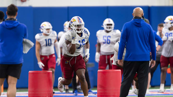 Kansas senior defensive end Justice Finkley (16) practices during Kansas Football Fan Appreciation Day Saturday, April. 5, 2025 at the Kansas Football Indoor Practice Facility in Lawrence, Kan.