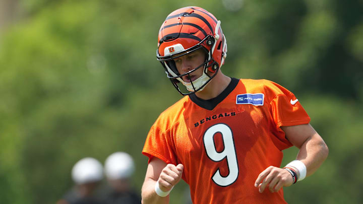 Jun 10, 2025; Cincinnati, OH, USA; Cincinnati Bengals quarterback Joe Burrow (9) jogs practice at Paycor Stadium. Mandatory Credit: Kareem Elgazzar-Imagn Images
