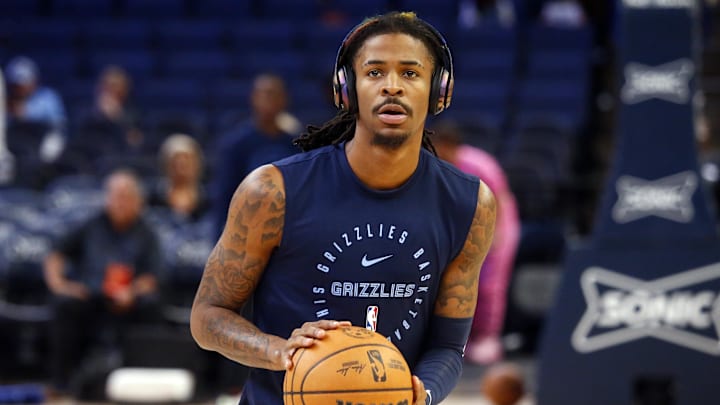Oct 31, 2024; Memphis, Tennessee, USA; Memphis Grizzlies guard Ja Morant (12) shoots during warm ups  prior to the game against the Milwaukee Bucks at FedExForum. Mandatory Credit: Petre Thomas-Imagn Images