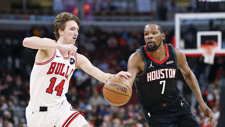 Mar 23, 2026; Chicago, Illinois, USA; Chicago Bulls forward Matas Buzelis (14) defends against Houston Rockets forward Kevin Durant (7) during the first half at United Center. Mandatory Credit: Kamil Krzaczynski-Imagn Images
