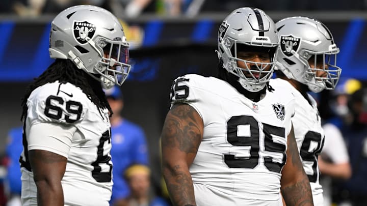 Oct 20, 2024; Inglewood, California, USA; Las Vegas Raiders defensive linemen (96), John Jenkins (95) and Jonah Laulu (96) during an NFL game again against the Los Angeles Rams at SoFi Stadium. Mandatory Credit: Robert Hanashiro-Imagn Images