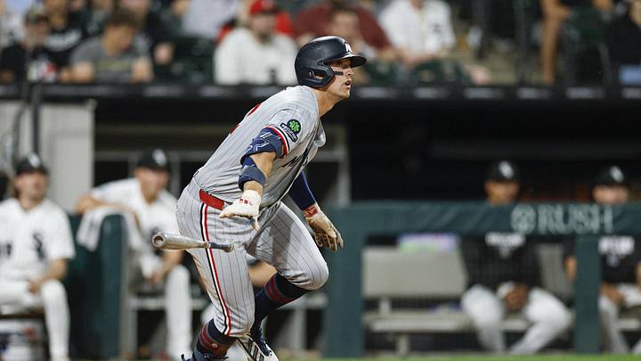 May 26, 2026; Chicago, Illinois, USA; Minnesota Twins third baseman Brooks Lee (22) hits a three-run double against the Chicago White Sox during the 11th inning at Rate Field. Mandatory Credit: Kamil Krzaczynski-Imagn Images