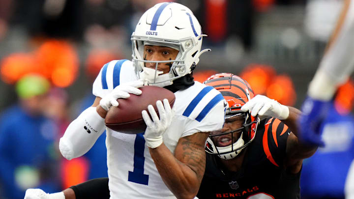 Indianapolis Colts wide receiver Josh Downs (1) completes a catch as Indianapolis Colts cornerback