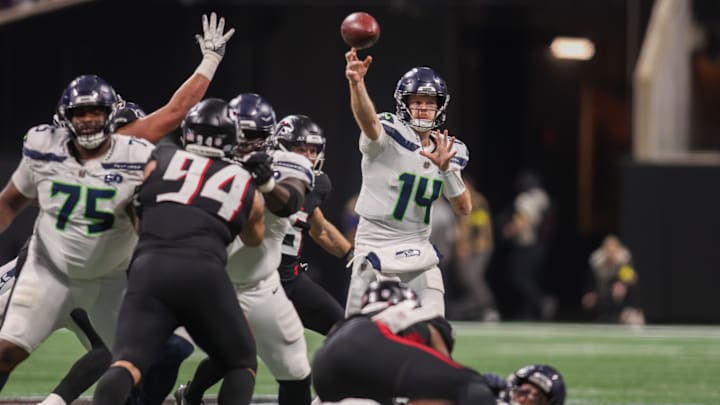 Dec 7, 2025; Atlanta, Georgia, USA; Seattle Seahawks quarterback Sam Darnold (14) throws a pass against the Atlanta Falcons in the fourth quarter at Mercedes-Benz Stadium. Mandatory Credit: Brett Davis-Imagn Images Dec 7, 2025; Atlanta, Georgia, USA; Seattle Seahawks quarterback Sam Darnold (14) throws a pass against the Atlanta Falcons in the fourth quarter at Mercedes-Benz Stadium. Mandatory Credit: Brett Davis-Imagn Images