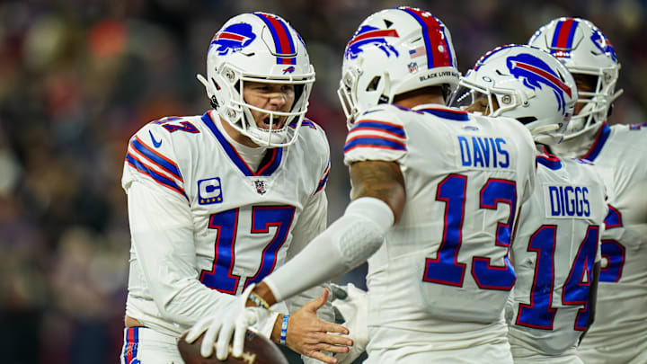 Buffalo Bills quarterback Josh Allen reacts after his touchdown pass to wide receiver Gabe Davis.