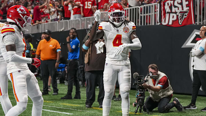 Sep 22, 2024; Atlanta, Georgia, USA; Kansas City Chiefs wide receiver Rashee Rice (4) reacts after scoring a touchdown against the Atlanta Falcons during the first half at Mercedes-Benz Stadium. Mandatory Credit: Dale Zanine-Imagn Images