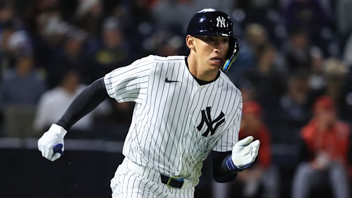 Feb 25, 2026; Tampa, Florida, USA; New York Yankees infielder George Lombard Jr (96) hits a two-RBI double during the fifth inning against the Washington Nationals at George M. Steinbrenner Field. Mandatory Credit: Kim Klement Neitzel-Imagn Images