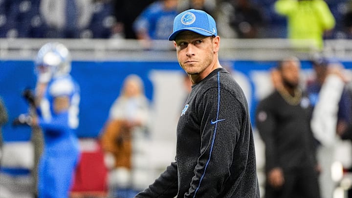 Detroit Lions offensive coordinator Ben Johnson watches warm up before the Tennessee Titans game at Ford Field in Detroit on Sunday, Oct. 27, 2024. Detroit Lions offensive coordinator Ben Johnson watches warm up before the Tennessee Titans game at Ford Field in Detroit on Sunday, Oct. 27, 2024.
