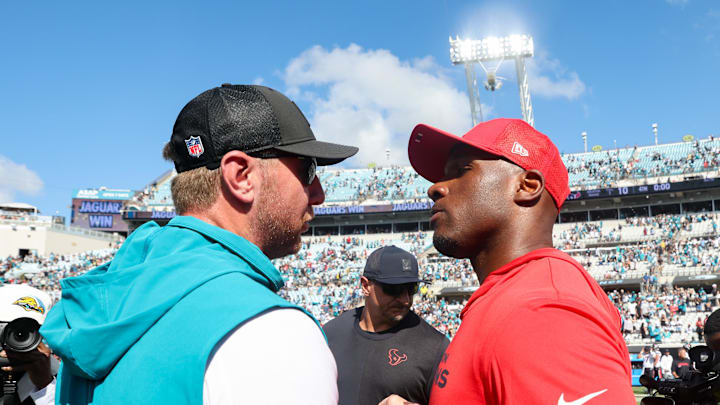 Sep 21, 2025; Jacksonville, Florida, USA; Jacksonville Jaguars head coach Liam Coen and Houston Texans head coach DeMeco Ryans shake hands after the game at EverBank Stadium. Mandatory Credit: Morgan Tencza-Imagn Images