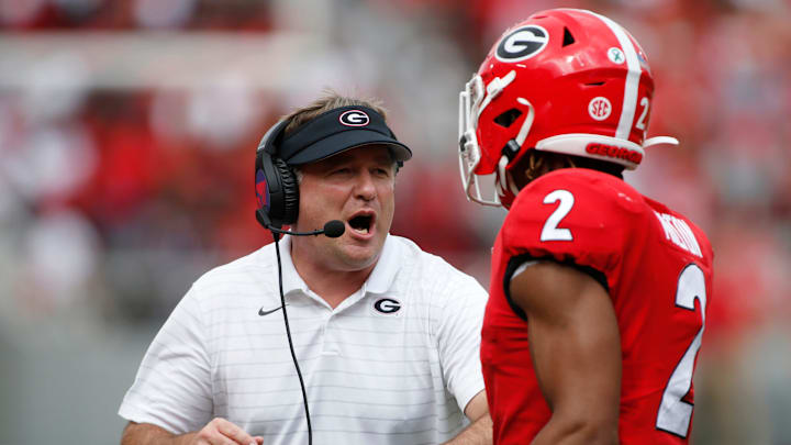 Georgia coach Kirby Smart celebrates with Georgia running back Kendall Milton (2) after he scored a touchdown during the first half of an NCAA college football game between Arkansas and Georgia in Athens, Ga., on Saturday, Oct. 2, 2021.

News Joshua L Jones