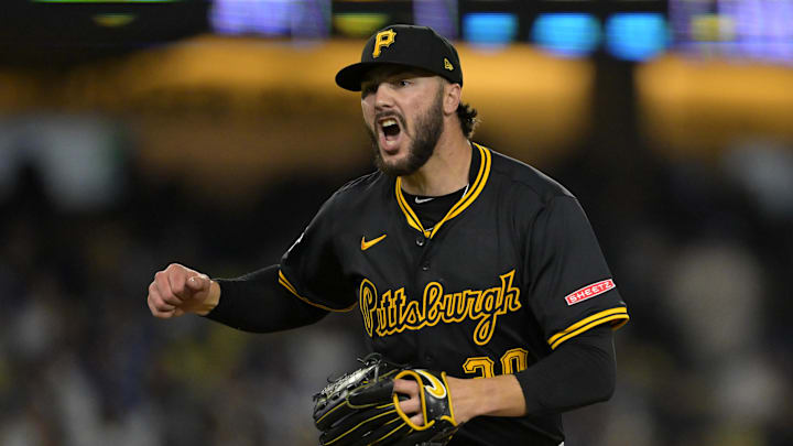 Apr 25, 2025; Los Angeles, California, USA;  Pittsburgh Pirates starting pitcher Paul Skenes (30) reacts after striking out Los Angeles Dodgers second baseman Tommy Edman (25) to end the sixth inning at Dodger Stadium. Mandatory Credit: Jayne Kamin-Oncea-Imagn Images