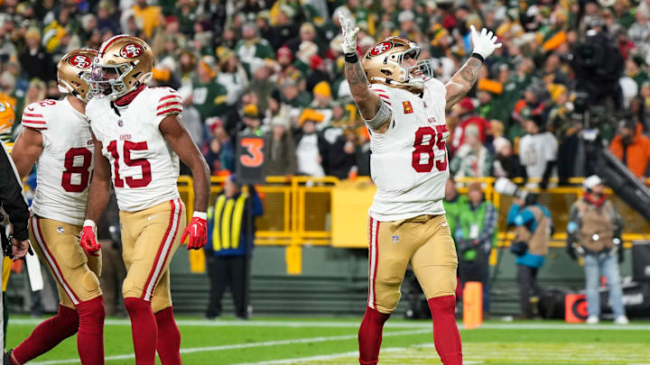 George Kittle celebrates a touchdown vs the Green Bay Packers