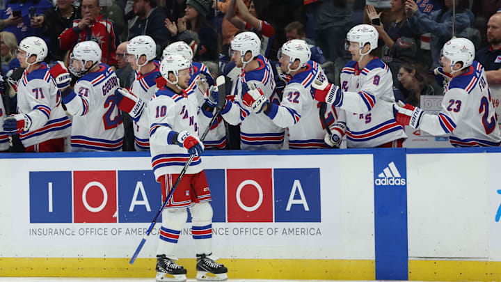 Dec 30, 2023; Tampa, Florida, USA; New York Rangers left wing Artemi Panarin (10) is congratulated