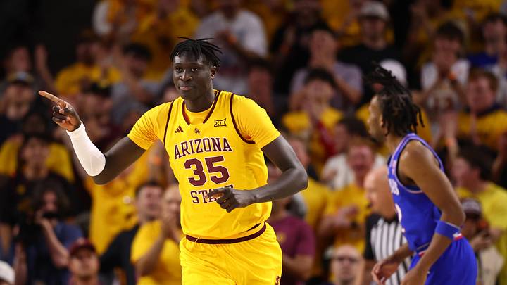 Mar 3, 2026; Tempe, Arizona, USA; Arizona State Sun Devils center Massamba Diop (35) celebrates a shot against the Kansas Jayhawks in the first half at Desert Financial Arena. Mandatory Credit: Mark J. Rebilas-Imagn Images