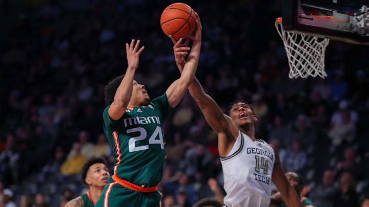 Jan 4, 2023; Atlanta, Georgia, USA; Miami Hurricanes guard Nijel Pack (24) grabs a rebound past