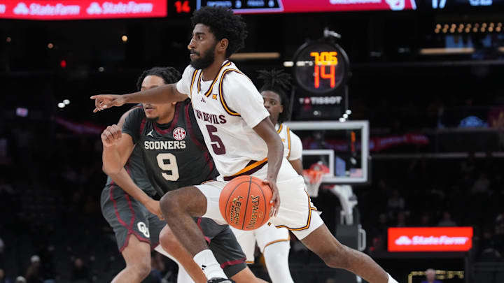 ASU Sun Devils guard Moe Odum (5) drives into the lane against the Oklahoma Sooners at Mortgage Matchup Center on Dec. 6, 2025, in Phoenix, Arizona. ASU Sun Devils guard Moe Odum (5) drives into the lane against the Oklahoma Sooners at Mortgage Matchup Center on Dec. 6, 2025, in Phoenix, Arizona.