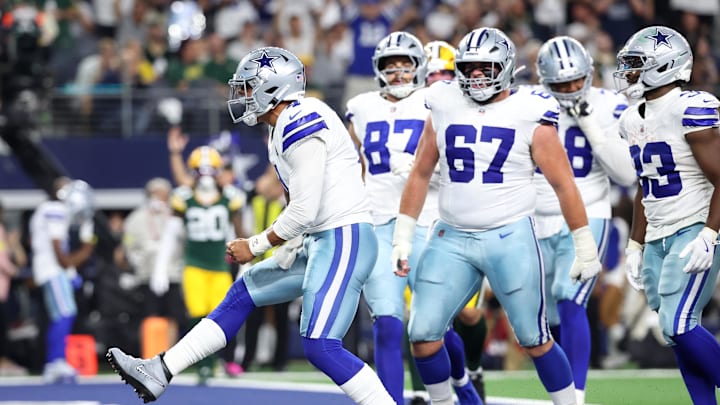 Dallas Cowboys quarterback Dak Prescott celebrates after scoring a touchdown against the Green Bay Packers