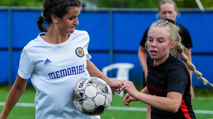Catholic Memorial's Claire Weber (left) traps a pass in front of Plymouth's Kalli Knowles (right) during the WIAA Division 3 girls state soccer championship at Uihlein Soccer Park in Milwaukee, Saturday, Jun 15, 2024.