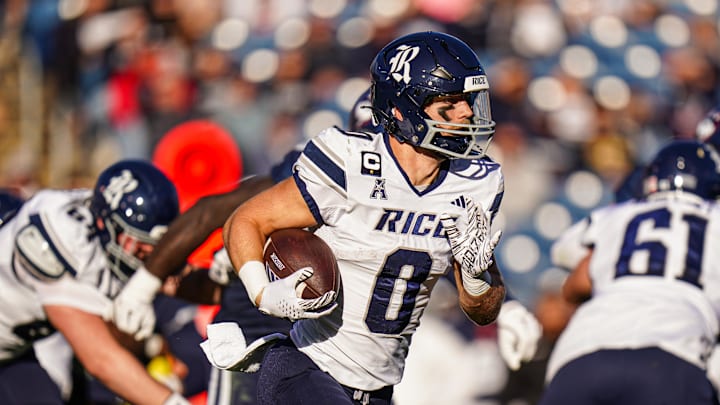 Oct 26, 2024; East Hartford, Connecticut, USA; Rice Owls running back Dean Connors (0) runs the ball against the Connecticut Huskies in the first quarter at Rentschler Field at Pratt & Whitney Stadium. Mandatory Credit: David Butler II-Imagn Images Oct 26, 2024; East Hartford, Connecticut, USA; Rice Owls running back Dean Connors (0) runs the ball against the Connecticut Huskies in the first quarter at Rentschler Field at Pratt & Whitney Stadium. Mandatory Credit: David Butler II-Imagn Images