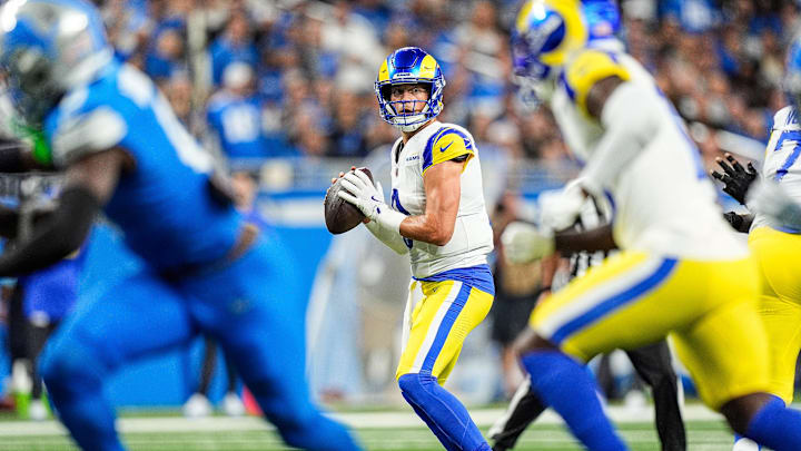Los Angeles Rams quarterback Matthew Stafford (9) looks to pass against Detroit Lions during the first half at Ford Field in Detroit on Sunday, September 8, 2024.