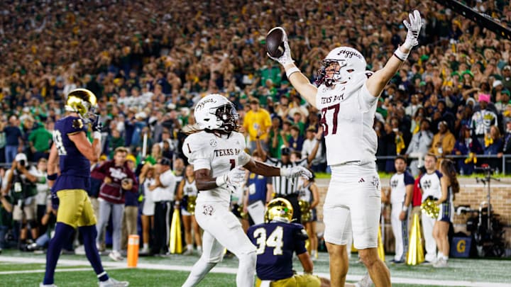 Texas A&M tight end Nate Boerkircher (87) celebrates after scoring a touchdown to tie the game in the second half of a NCAA football game against Notre Dame at Notre Dame Stadium on Saturday, Sept. 13, 2025, in South Bend. The extra point scored after this touchdown put Texas A&M ahead 41-40 to win the game.