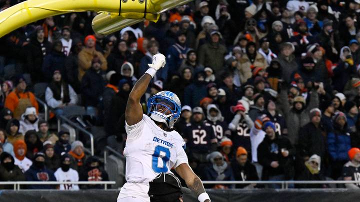 Jan 4, 2026; Chicago, Illinois, USA; Detroit Lions running back Jahmyr Gibbs (0) celebrates after scoring a touchdown against the Chicago Bears during the first half at Soldier Field. Mandatory Credit: Matt Marton-Imagn Images Jan 4, 2026; Chicago, Illinois, USA; Detroit Lions running back Jahmyr Gibbs (0) celebrates after scoring a touchdown against the Chicago Bears during the first half at Soldier Field. Mandatory Credit: Matt Marton-Imagn Images