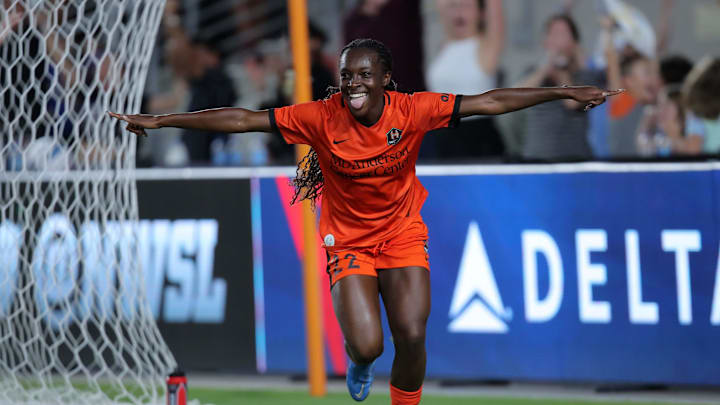 Aug 27, 2022; Houston, Texas, USA; Houston Dash forward Michelle Alozie (22) celebrates her goal