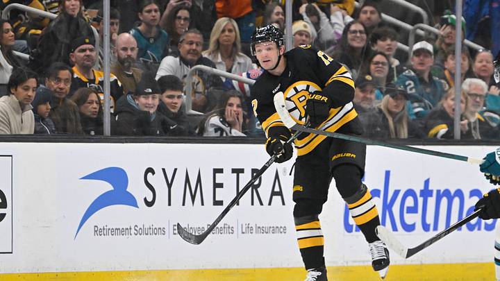 Oct 24, 2026; Boston, Massachusetts, USA; Boston Bruins defenseman Will Borgen (17) scores a goal against the San Jose Sharks' empty net during the third period at TD Garden. Mandatory Credit: Eric Canha-Imagn Images