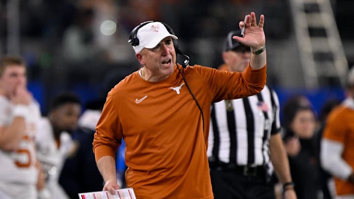 Jan 10, 2025; Arlington, TX, USA; Texas Longhorns offensive coordinator Kyle Flood during the game between the Texas Longhorns and the Ohio State Buckeyes at AT&T Stadium. Mandatory Credit: Jerome Miron-Imagn Images