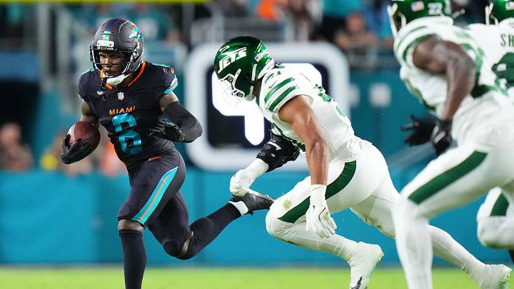 Miami Dolphins wide receiver Malik Washington (6) makes a catch against New York Jets cornerback Brandon Stephens (21) during the first half at Hard Rock Stadium in September 2025. Miami Dolphins wide receiver Malik Washington (6) makes a catch against New York Jets cornerback Brandon Stephens (21) during the first half at Hard Rock Stadium in September 2025.
