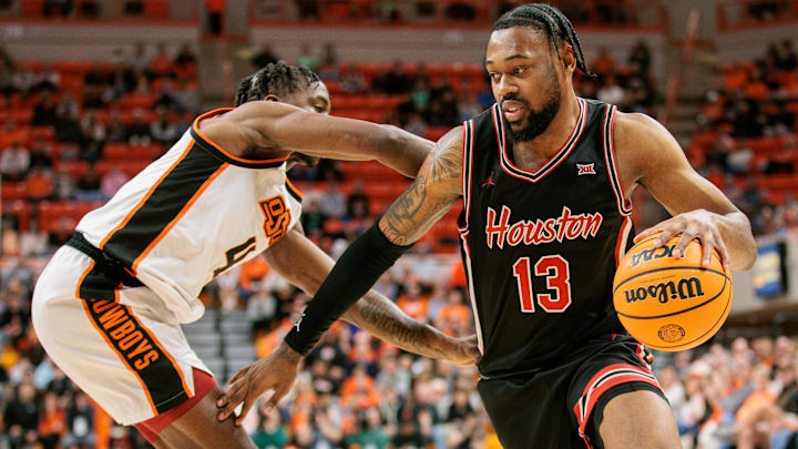 Houston forward J'Wan Roberts (right)