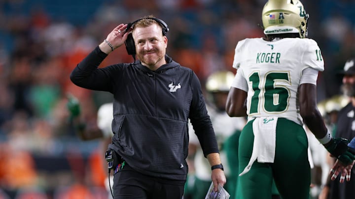Sep 13, 2025; Miami Gardens, Florida, USA; South Florida Bulls head coach Alex Golesh looks on against the Miami Hurricanes in the third quarter at Hard Rock Stadium. Mandatory Credit: Nathan Ray Seebeck-Imagn Images Sep 13, 2025; Miami Gardens, Florida, USA; South Florida Bulls head coach Alex Golesh looks on against the Miami Hurricanes in the third quarter at Hard Rock Stadium. Mandatory Credit: Nathan Ray Seebeck-Imagn Images