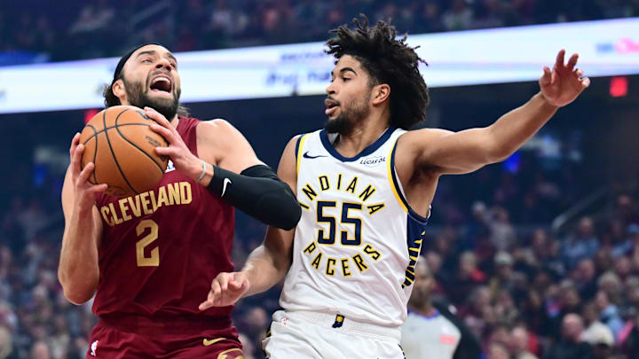 Apr 5, 2026; Cleveland, Ohio, USA; Cleveland Cavaliers guard Max Strus (2) drives to the basket against Indiana Pacers guard Ethan Thompson (55) during the first half at Rocket Arena. Mandatory Credit: Ken Blaze-Imagn Images