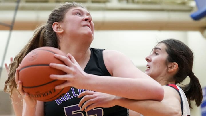 Plainfield's Caroline Pugh (25) guards Brownsburg's Avery Gordon (55)