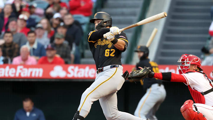 Anaheim, California, USA; Pittsburgh Pirates first baseman Matt Gorski (62) hits a home run during the second inning against the Los Angeles Angels at Angel Stadium. Gorski hits his first MLB home run in the first MLB at bat.