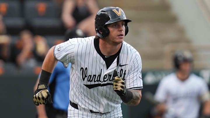 Vanderbilt infielder Braden Holcomb (26) runs to first base during a NCAA baseball game between the Tennessee Volunteers and Vanderbilt Commodores at Lindsey Nelson Stadium on May 11, 2025. Vanderbilt infielder Braden Holcomb (26) runs to first base during a NCAA baseball game between the Tennessee Volunteers and Vanderbilt Commodores at Lindsey Nelson Stadium on May 11, 2025.