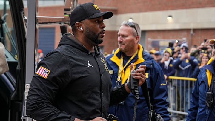 Michigan head coach Sherrone Moore walks off the bus as the team arrive at Michigan Stadium in Ann Arbor ahead of Purdue game on Saturday, November 1, 2025. Michigan head coach Sherrone Moore walks off the bus as the team arrive at Michigan Stadium in Ann Arbor ahead of Purdue game on Saturday, November 1, 2025.