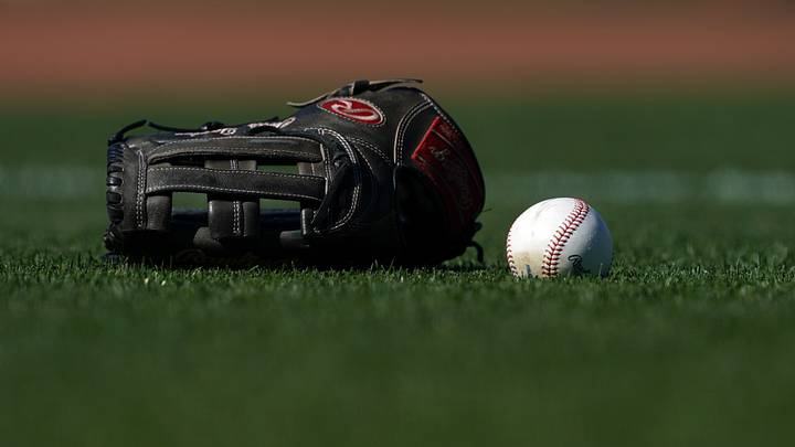A ball and glove on the field at Oracle Park | Credit: Darren Yamashita A ball and glove on the field at Oracle Park | Credit: Darren Yamashita