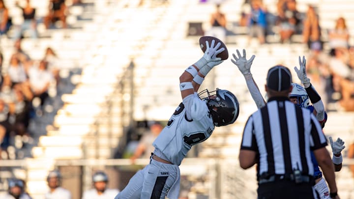 A Volcano Vista player intercepts a pass during a high school football on Friday, August 18, 2023, at the Field of Dreams.
