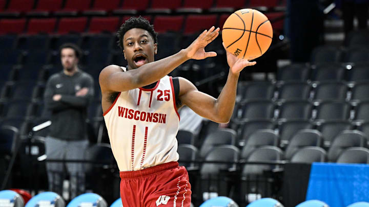 Mar 18, 2026; Portland, OR, USA; Wisconsin Badgers guard John Blackwell (25) runs a drill during a practice session ahead of the first round of the men's 2026 NCAA Tournament at Moda Center. Mandatory Credit: Craig Strobeck-Imagn Images