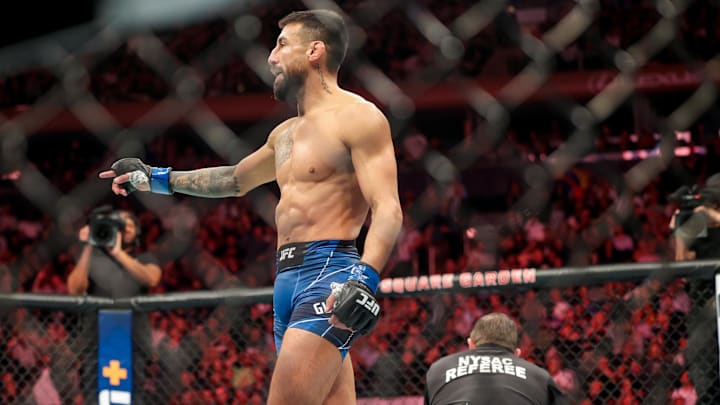 Nov 12, 2022; New York, NY, USA; Chris Gutierrez (blue gloves) defeats Frankie Edgar (red gloves)