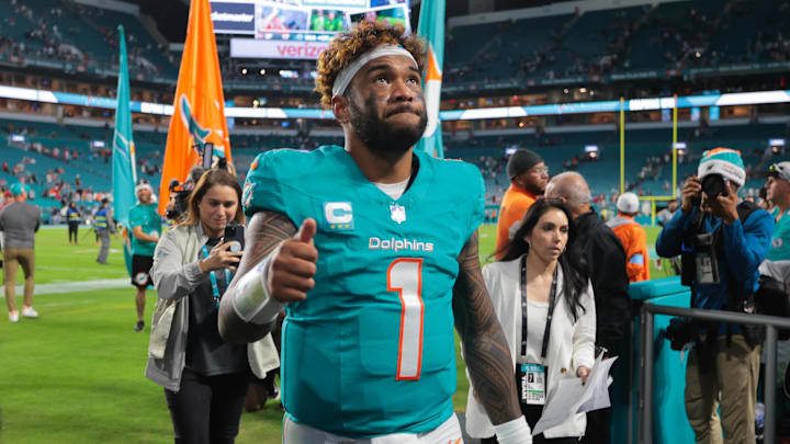 Miami Dolphins quarterback Tua Tagovailoa (1) walks off the field after the Week 16 victory against the San Francisco 49ers.