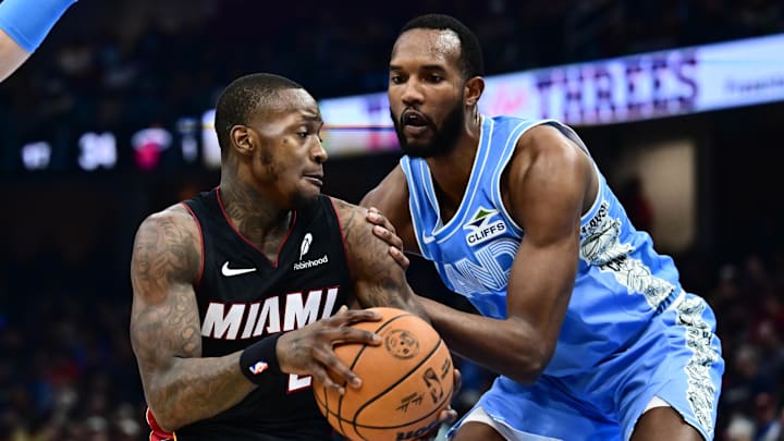 Mar 5, 2025; Cleveland, Ohio, USA; Miami Heat guard Terry Rozier (2) drives to the basket against Cleveland Cavaliers forward Evan Mobley (4) during the first half at Rocket Arena. Mandatory Credit: Ken Blaze-Imagn Images