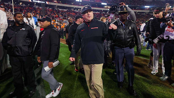 Nov 16, 2024; Athens, Georgia, USA; Georgia Bulldogs head coach Kirby Smart celebrates after a victory over the Tennessee Volunteers at Sanford Stadium. Mandatory Credit: Brett Davis-Imagn Images
