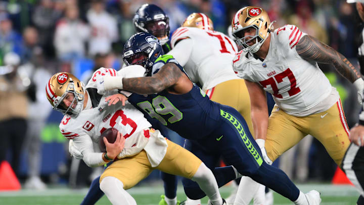 Jan 17, 2026; Seattle, WA, USA; San Francisco 49ers quarterback Brock Purdy (13) is sacked by Seattle Seahawks defensive end Leonard Williams (99) during the second half in an NFC Divisional Round game at Lumen Field. Mandatory Credit: Steven Bisig-Imagn Images Jan 17, 2026; Seattle, WA, USA; San Francisco 49ers quarterback Brock Purdy (13) is sacked by Seattle Seahawks defensive end Leonard Williams (99) during the second half in an NFC Divisional Round game at Lumen Field. Mandatory Credit: Steven Bisig-Imagn Images